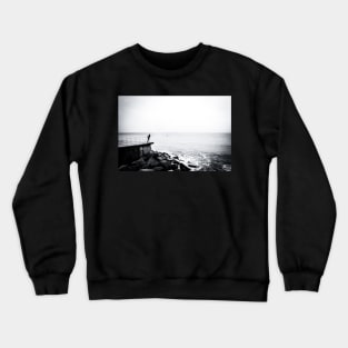 Solitary man at Cromer beach in Norfolk Crewneck Sweatshirt